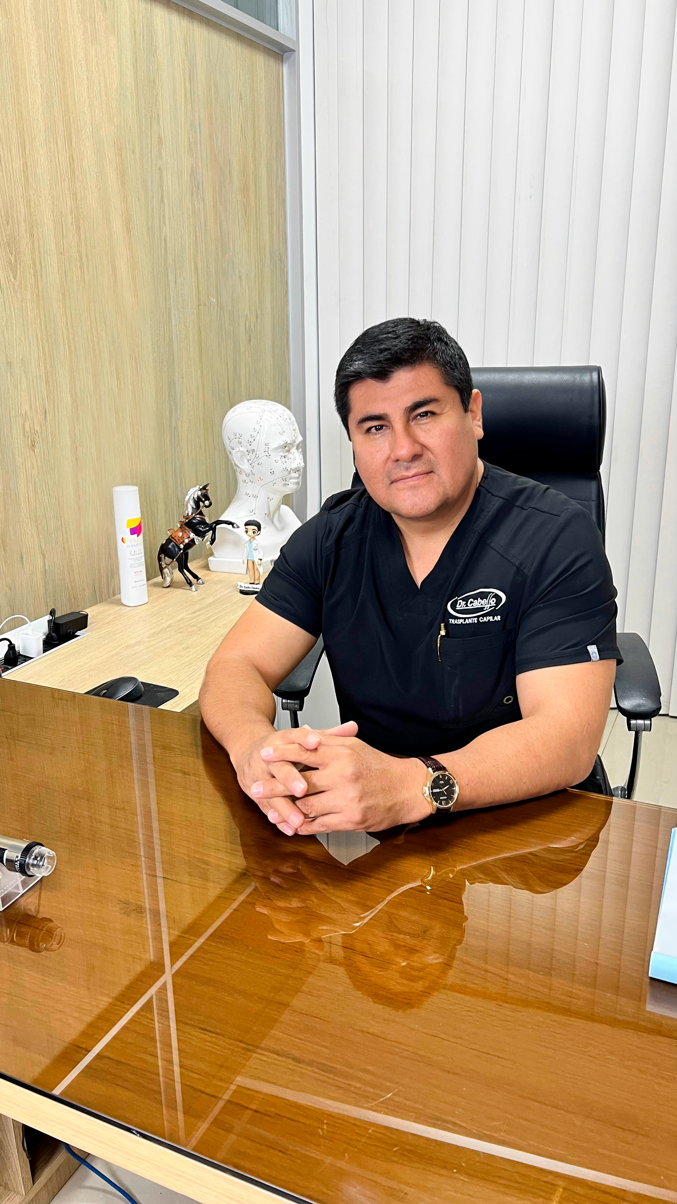 Dr. Carlos Condori